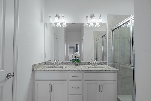 15242 Sunny Day Dr, Bradenton, FL 34211 - full bath featuring a shower stall, double vanity, and a sink