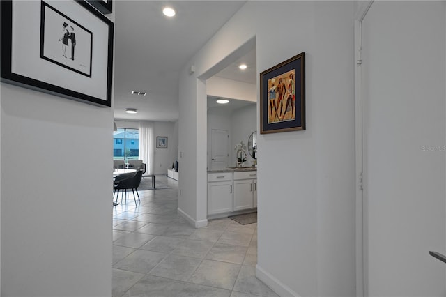 15242 Sunny Day Dr, Bradenton, FL 34211 - corridor with recessed lighting, light tile patterned floors, a sink, baseboards, and visible vents