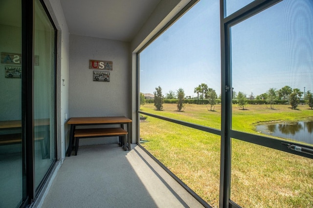 15242 Sunny Day Dr, Bradenton, FL 34211 - sunroom / solarium with a water view