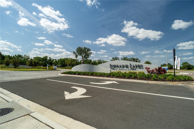 15242 Sunny Day Dr, Bradenton, FL 34211 - view of road featuring curbs and street lighting