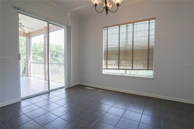 7613 Bay Port Rd Unit 34, Orlando, FL 32819 - unfurnished room featuring ceiling fan with notable chandelier, dark tile patterned flooring, ornamental molding, and baseboards