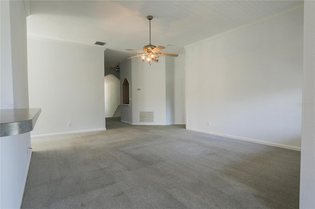 7613 Bay Port Rd Unit 34, Orlando, FL 32819 - unfurnished living room featuring crown molding, visible vents, carpet floors, arched walkways, and a ceiling fan