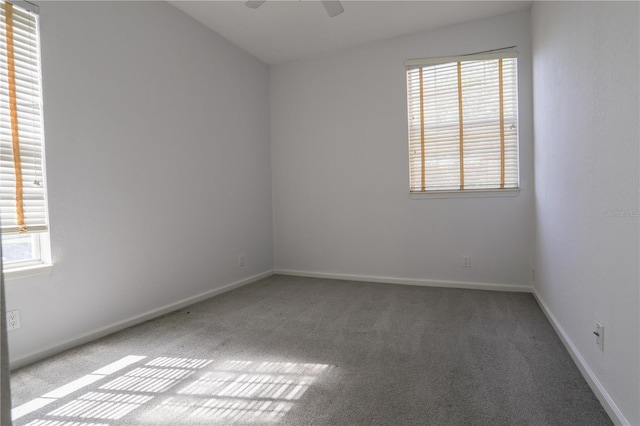 7613 Bay Port Rd Unit 34, Orlando, FL 32819 - spare room featuring a ceiling fan, carpet flooring, and baseboards