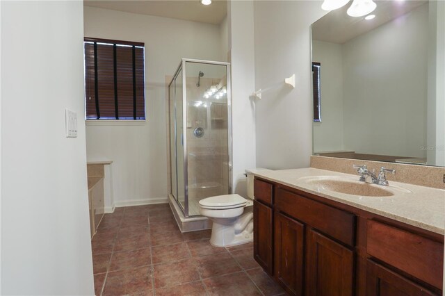 7613 Bay Port Rd Unit 34, Orlando, FL 32819 - full bathroom with a shower stall, baseboards, toilet, tile patterned floors, and vanity