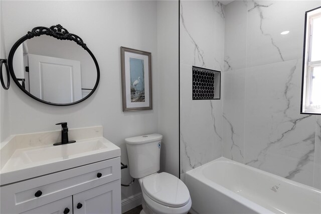 full bath with toilet, vanity, and shower / bath combination