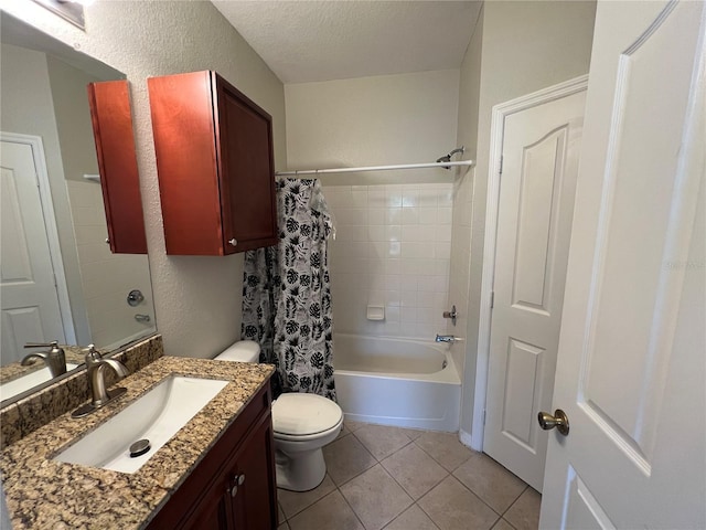 bathroom with tile patterned floors, toilet, vanity, shower / bathtub combination with curtain, and a textured ceiling