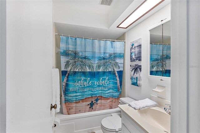 full bath with shower / bath combo, toilet, vanity, and visible vents