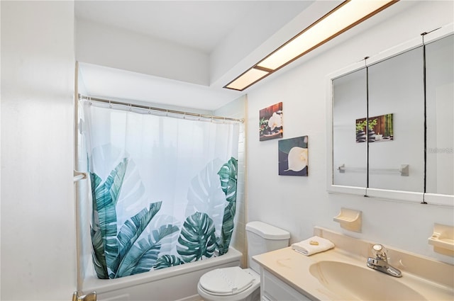 full bathroom featuring shower / tub combo with curtain, vanity, and toilet