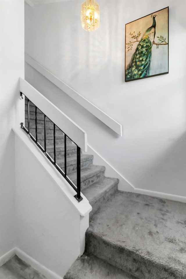3106 S Semoran Blvd Unit P-2, Orlando, FL 32822 - stairway with baseboards and carpet