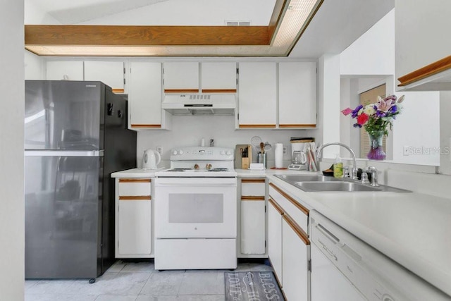 3106 S Semoran Blvd Unit P-2, Orlando, FL 32822 - kitchen with white appliances, under cabinet range hood, a sink, and light countertops