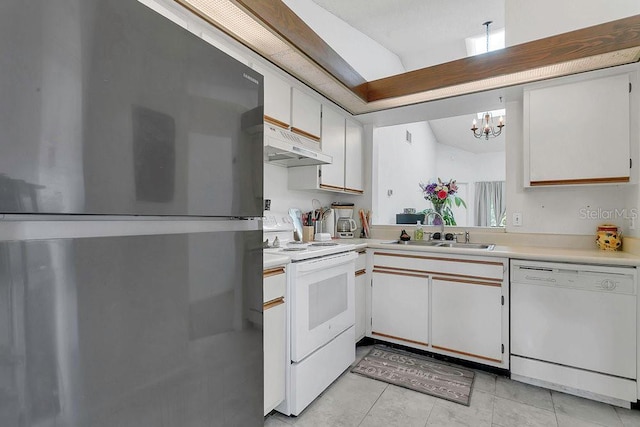 3106 S Semoran Blvd Unit P-2, Orlando, FL 32822 - kitchen with white appliances, under cabinet range hood, a sink, light countertops, and a chandelier