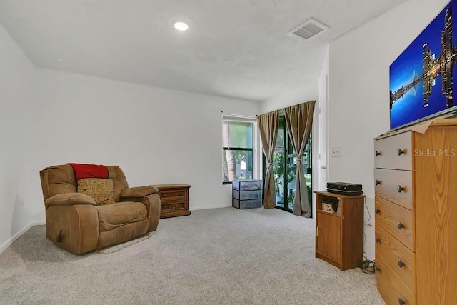 3106 S Semoran Blvd Unit P-2, Orlando, FL 32822 - sitting room with light colored carpet and baseboards