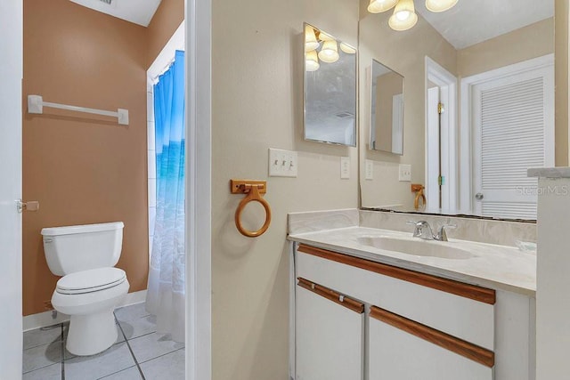 3106 S Semoran Blvd Unit P-2, Orlando, FL 32822 - full bath with toilet, tile patterned flooring, vanity, a shower with curtain, and baseboards