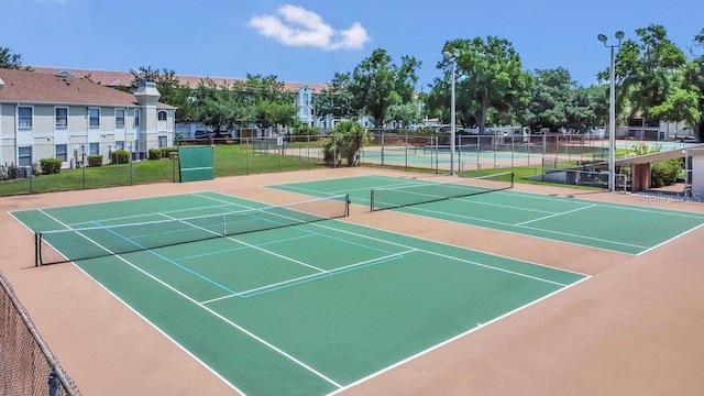 3106 S Semoran Blvd Unit P-2, Orlando, FL 32822 - view of tennis court featuring community basketball court