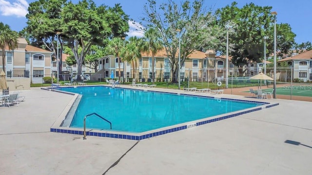 3106 S Semoran Blvd Unit P-2, Orlando, FL 32822 - community pool with a tennis court