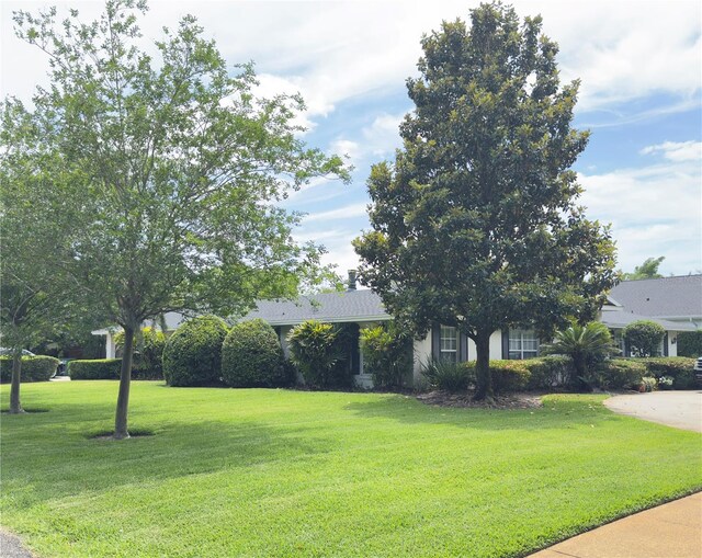 1644 Hibiscus Ave, Winter Park, FL 32789 - view of front facade with a front yard