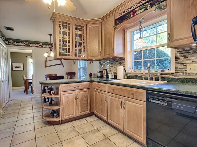 1644 Hibiscus Ave, Winter Park, FL 32789 - kitchen featuring open shelves, dark countertops, visible vents, a sink, and black dishwasher