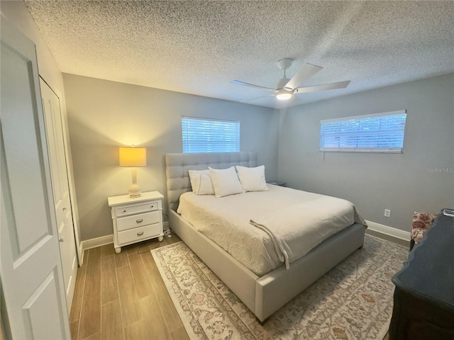1644 Hibiscus Ave, Winter Park, FL 32789 - bedroom with wood finished floors, baseboards, and multiple windows