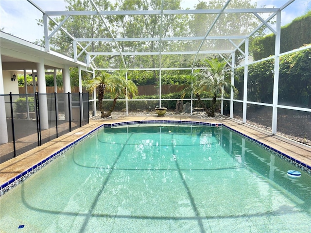 1644 Hibiscus Ave, Winter Park, FL 32789 - view of swimming pool with glass enclosure, a fenced in pool, a patio, and fence