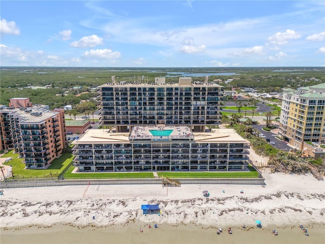 4139 S Atlantic Ave Unit B707, New Smyrna Beach, FL 32169 - drone / aerial view with a beach view and a water view