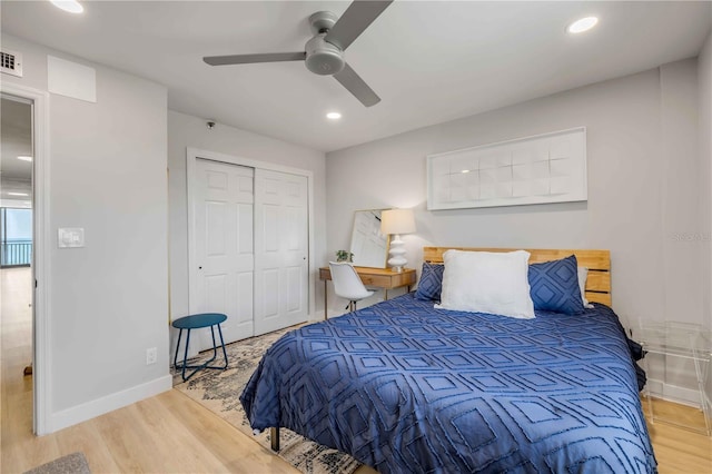 4139 S Atlantic Ave Unit B707, New Smyrna Beach, FL 32169 - bedroom with baseboards, recessed lighting, wood finished floors, and a closet