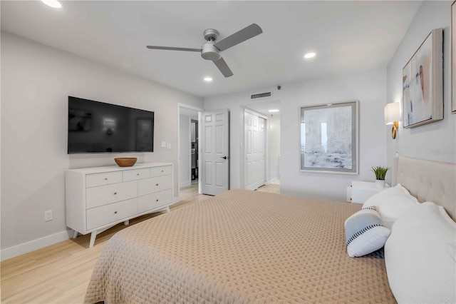 4139 S Atlantic Ave Unit B707, New Smyrna Beach, FL 32169 - bedroom featuring recessed lighting, baseboards, ensuite bathroom, light wood-type flooring, and visible vents