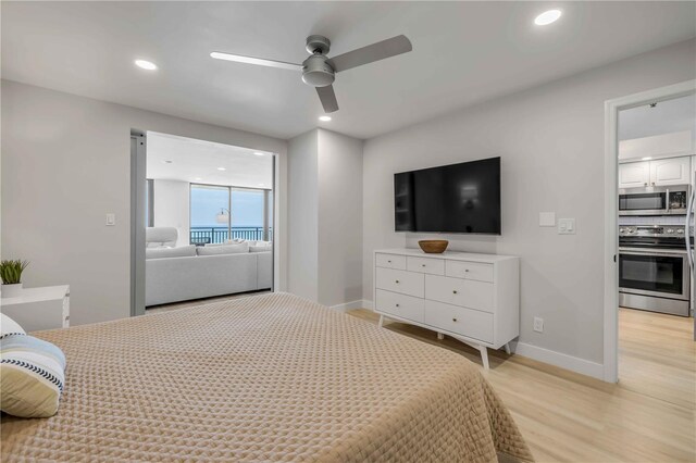 4139 S Atlantic Ave Unit B707, New Smyrna Beach, FL 32169 - bedroom with baseboards, recessed lighting, and light wood-style flooring