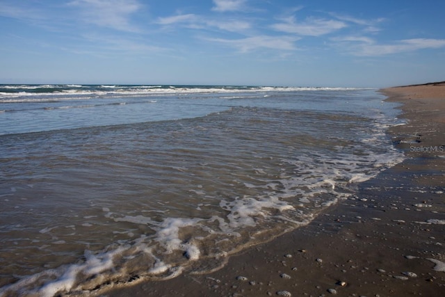 4139 S Atlantic Ave Unit B707, New Smyrna Beach, FL 32169 - property view of water featuring a beach view