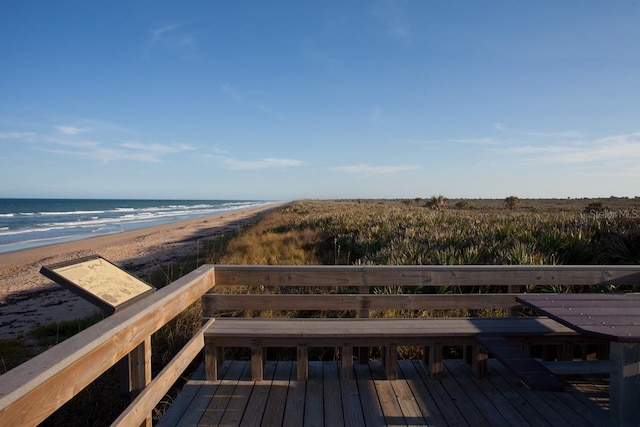 4139 S Atlantic Ave Unit B707, New Smyrna Beach, FL 32169 - view of community featuring a deck with water view and a view of the beach