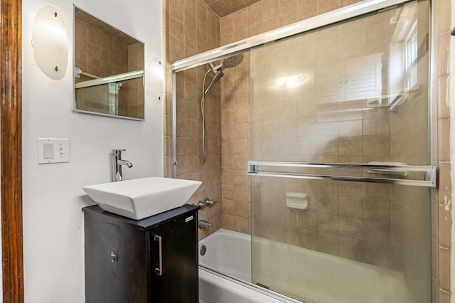 6021 Navajo Way, Orlando, FL 32807 - bathroom featuring combined bath / shower with glass door and vanity