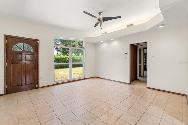 6021 Navajo Way, Orlando, FL 32807 - spare room featuring light tile patterned flooring, visible vents, a ceiling fan, and baseboards