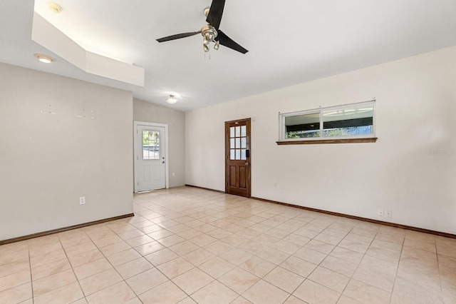 6021 Navajo Way, Orlando, FL 32807 - spare room with light tile patterned floors, ceiling fan, and baseboards