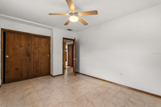 6021 Navajo Way, Orlando, FL 32807 - unfurnished bedroom featuring baseboards, visible vents, ceiling fan, and a closet