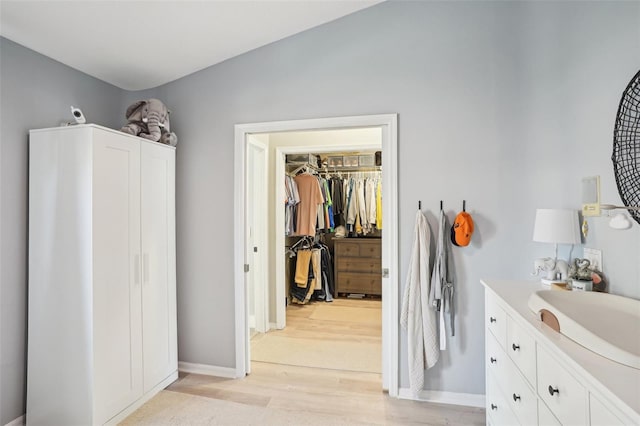 336 Plantation Club Dr, Debary, FL 32713 - interior space with baseboards, wood finished floors, and vanity