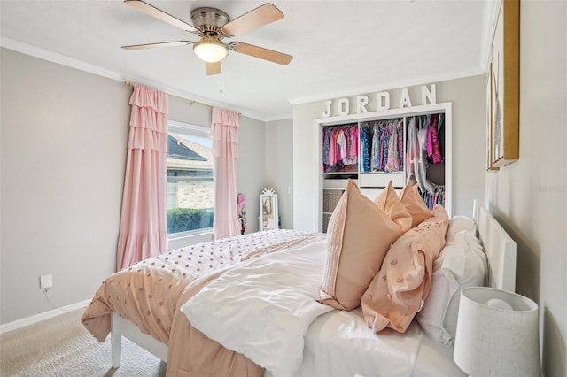 336 Plantation Club Dr, Debary, FL 32713 - carpeted bedroom featuring baseboards, ornamental molding, ceiling fan, and a closet