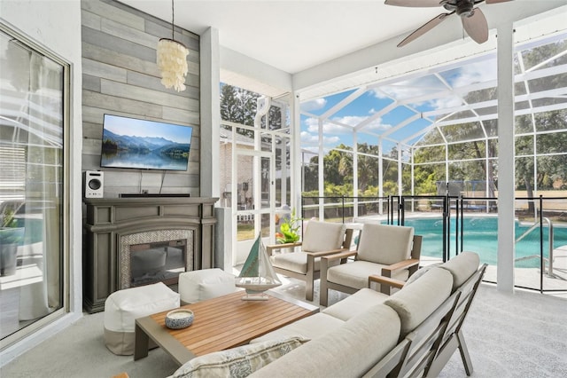 336 Plantation Club Dr, Debary, FL 32713 - sunroom with a ceiling fan, an outdoor living space with a fireplace, and a pool