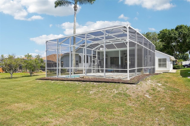 336 Plantation Club Dr, Debary, FL 32713 - back of house featuring a patio, a ceiling fan, a lanai, and a yard