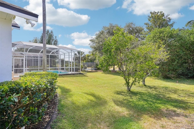 336 Plantation Club Dr, Debary, FL 32713 - view of yard with a lanai and a trampoline