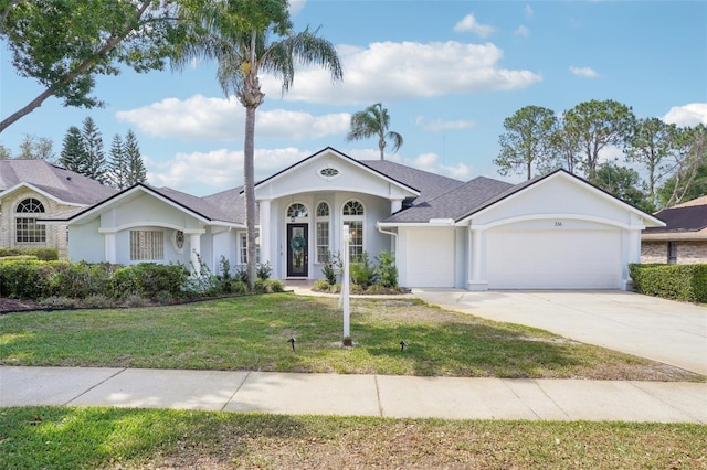 336 Plantation Club Dr, Debary, FL 32713 - ranch-style house featuring a garage, a front lawn, stucco siding, and concrete driveway