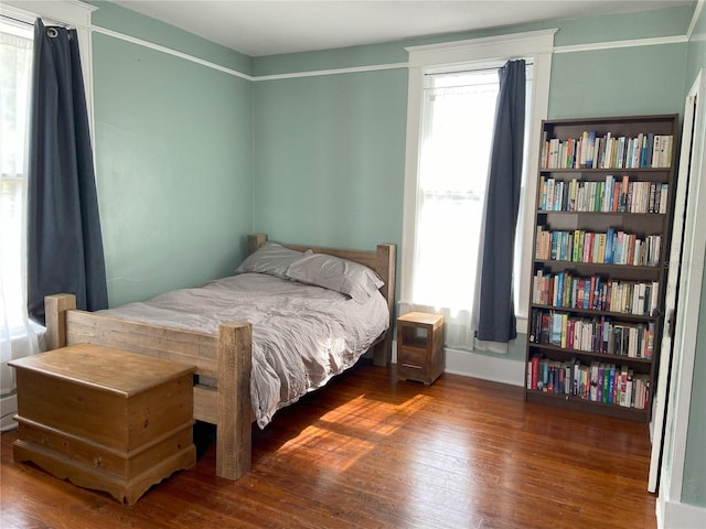 209 E 4th St, Sanford, FL 32771 - bedroom with hardwood / wood-style floors