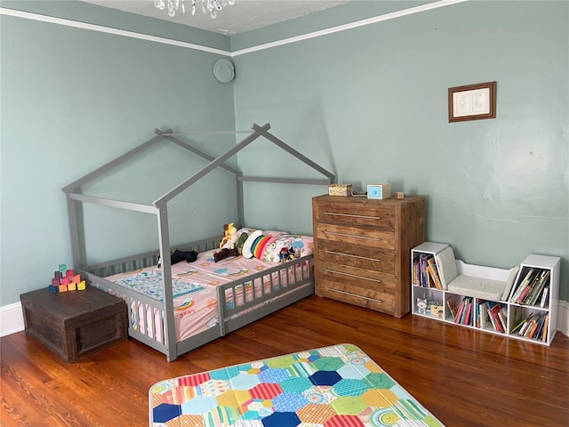 209 E 4th St, Sanford, FL 32771 - bedroom featuring wood finished floors