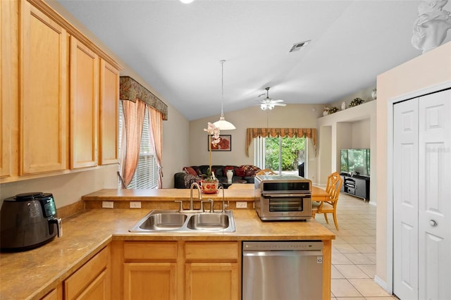 kitchen featuring a sink, ceiling fan, visible vents, dishwasher, and a peninsula