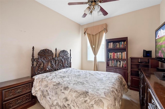 bedroom featuring ceiling fan and light colored carpet