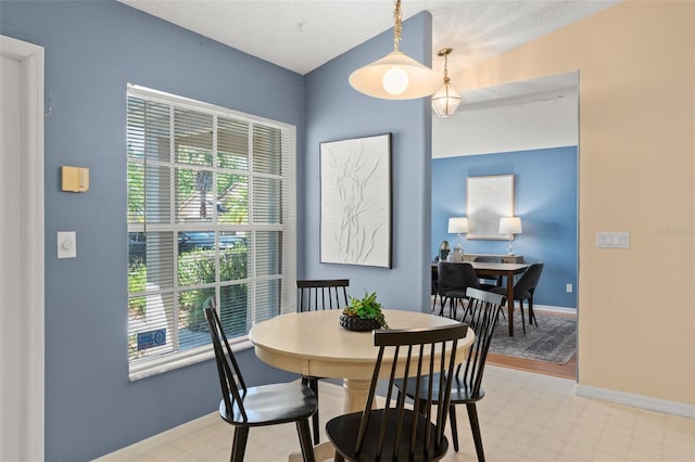 4306 Pebblestone Ct, Orlando, FL 32826 - dining area featuring light flooring and baseboards