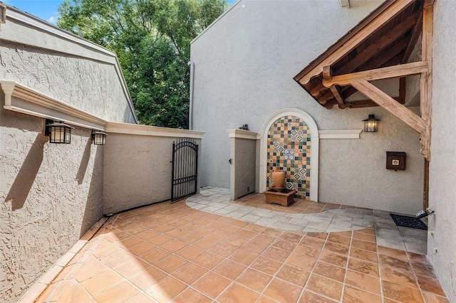 view of patio / terrace with a gate
