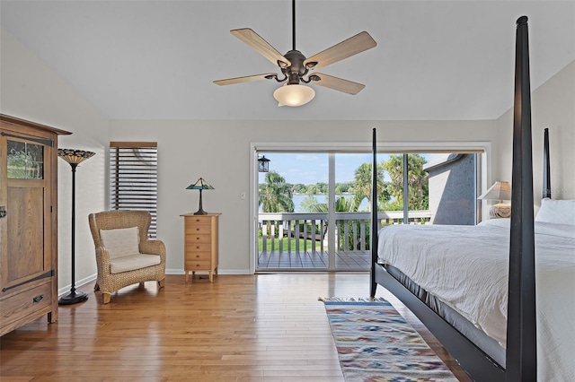 bedroom with lofted ceiling, ceiling fan, access to exterior, baseboards, and wood finished floors