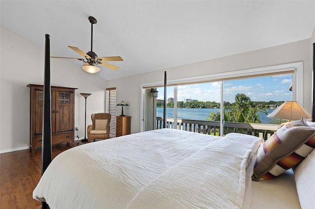 bedroom featuring a water view, baseboards, dark wood finished floors, high vaulted ceiling, and access to outside