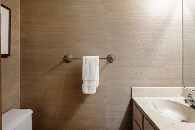 half bath with toilet and vanity