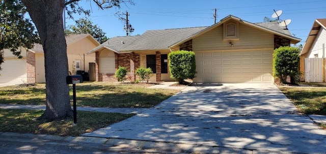 single story home featuring driveway, brick siding, and a garage