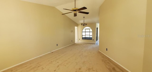 spare room with lofted ceiling, baseboards, light carpet, and ceiling fan with notable chandelier